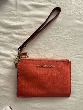 Michael Kors Coral Orange Pebble Leather Wristlet with Gold Hardware
